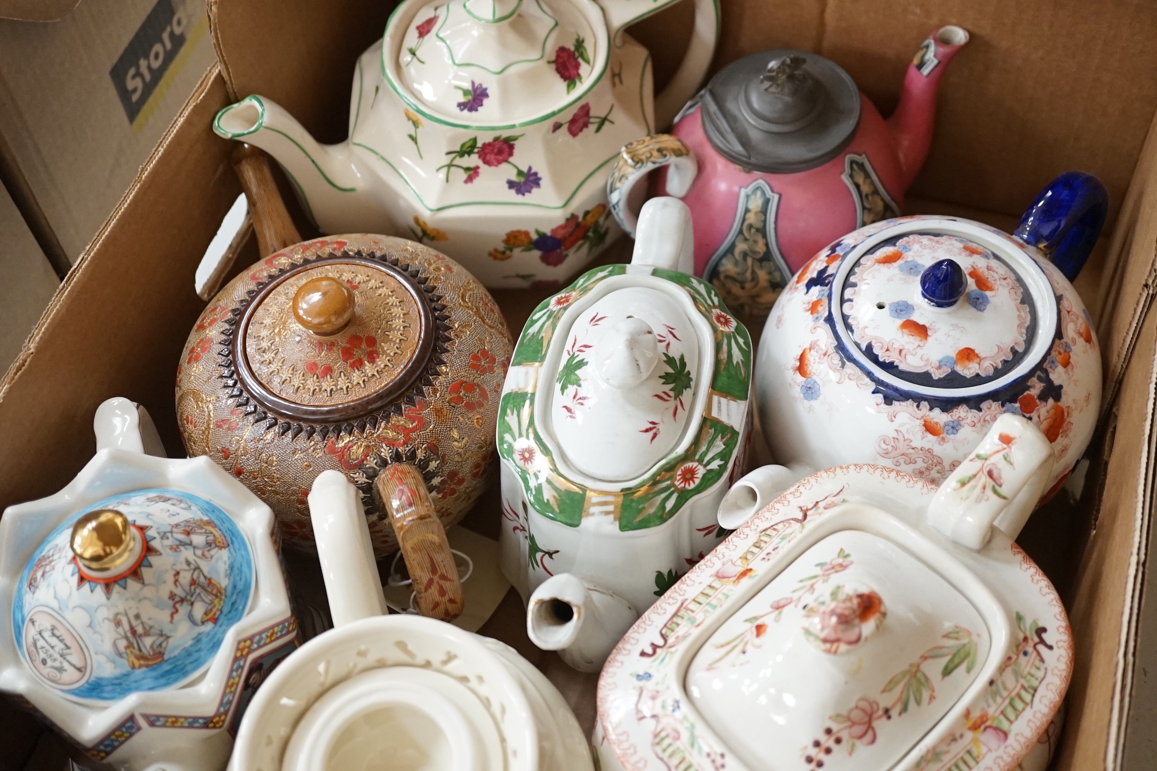 A quantity of various teapots including Doulton, Sadler etc.